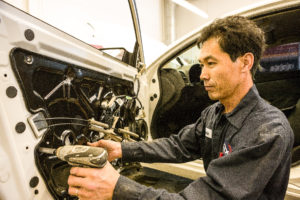 Fix Auto technician professionally repairing