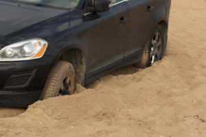 Black Car Stuck in Sand