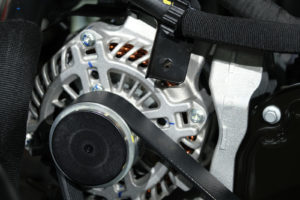 Engine of A car.close up photo of one of the drive belts