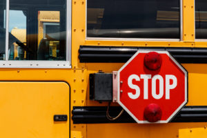 Stop Sign On The Side Of A School Bus