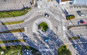 Aerial View Of The Roundabout. The Cars Moving On The Roundabout
