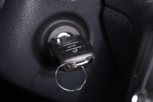 Close up of a car key stuck in ignition
