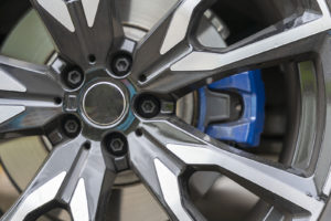 close up photo of a car's new wheel and brake disc
